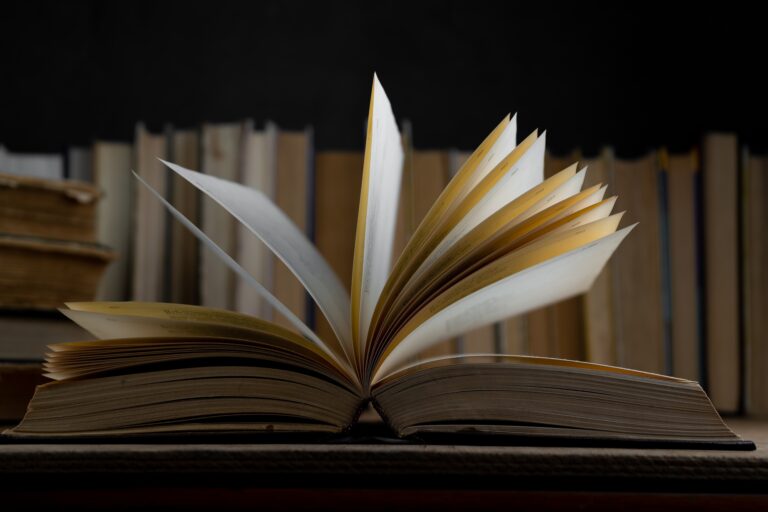 Book background. Old books in the library. Bookshelf shop. Knowledge, publications, literature